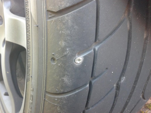 Screw lodged in a car tyre tread, the kind of puncture repaired in Waterford